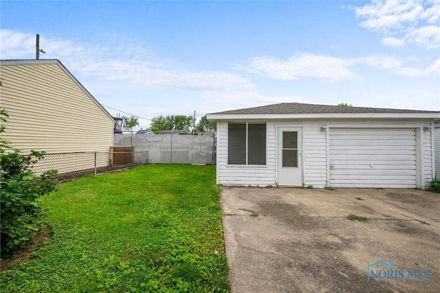 3431 146th St, Toledo, OH 43611 - view of yard featuring a garage and driveway