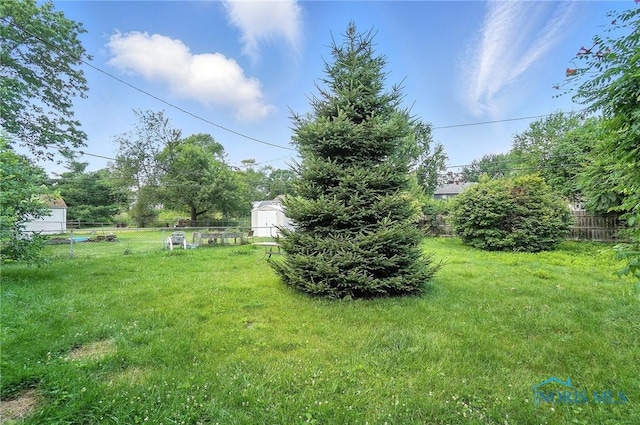 1732 Gilbert Rd, Toledo, OH 43614 - view of yard with a storage shed