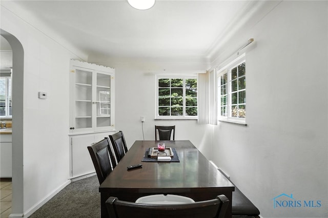 1732 Gilbert Rd, Toledo, OH 43614 - carpeted dining room with arched walkways and baseboards