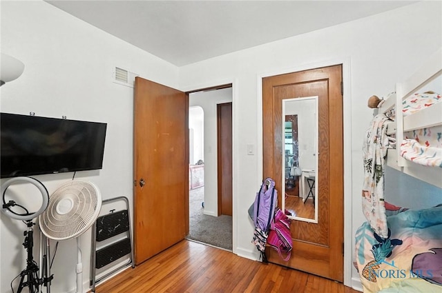 1732 Gilbert Rd, Toledo, OH 43614 - bedroom with wood finished floors and heating unit
