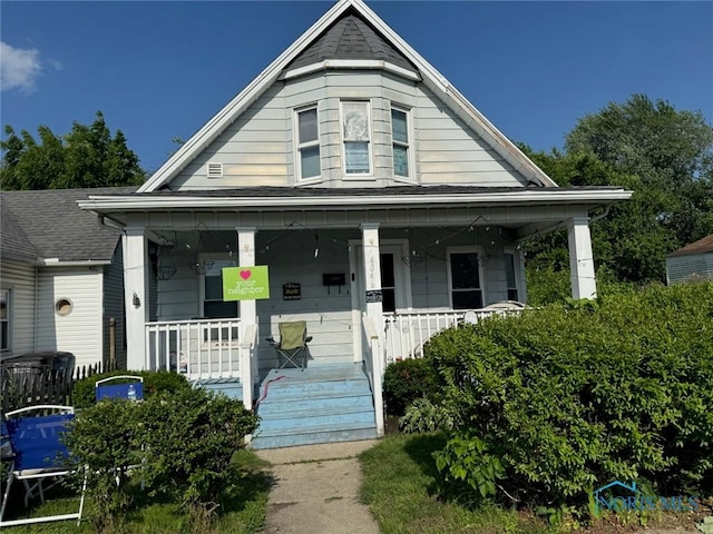 4046 Peak Ave, Toledo, OH 43612 - view of front of house with a porch and a shingled roof
