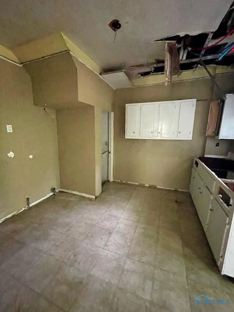 2024 Elliott Ave, Toledo, OH 43606 - kitchen featuring white cabinetry