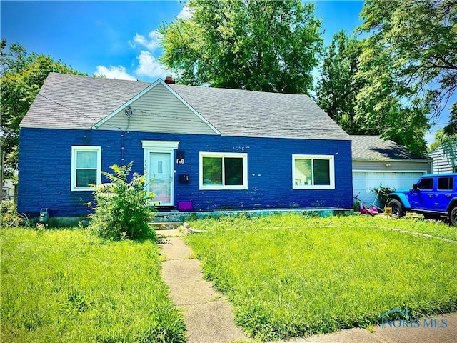 1708 Fredonia Ave, Toledo, OH 43608 - view of front of property featuring a shingled roof