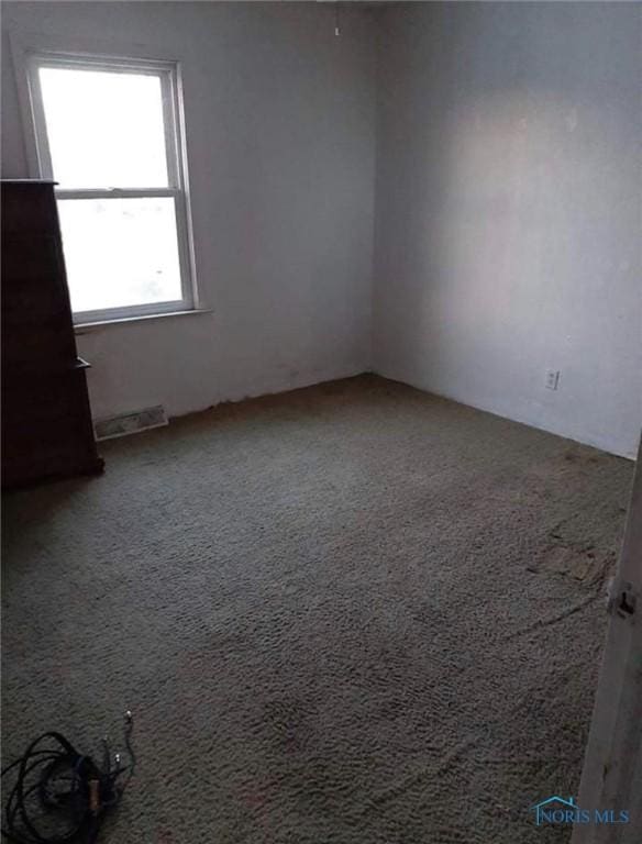 1708 Fredonia Ave, Toledo, OH 43608 - view of carpeted spare room