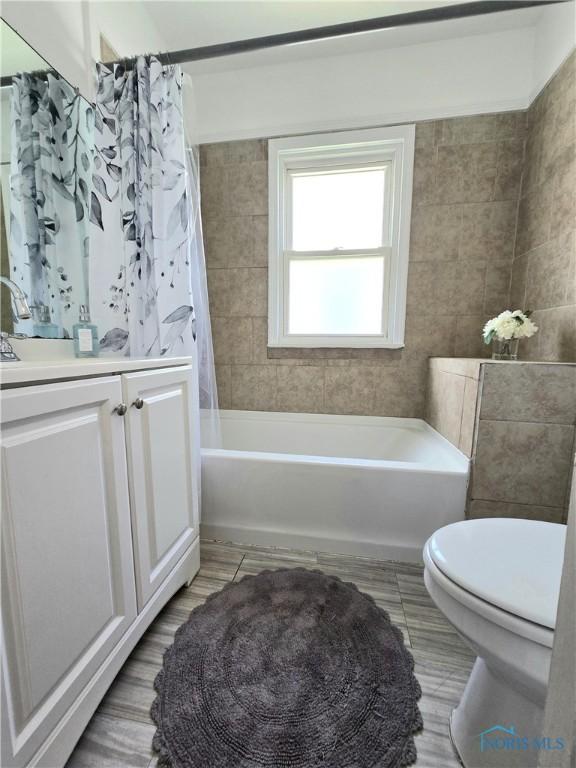 1723 Balkan Pl, Toledo, OH 43613 - full bathroom with vanity and shower / bath combination with curtain
