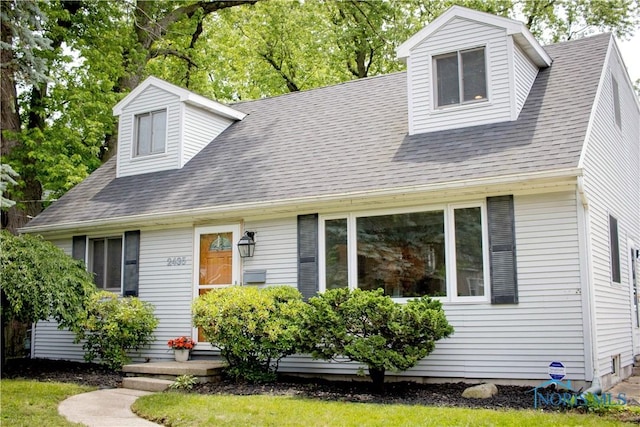 2435 Lark Ave, Toledo, OH 43613 - cape cod house featuring a shingled roof