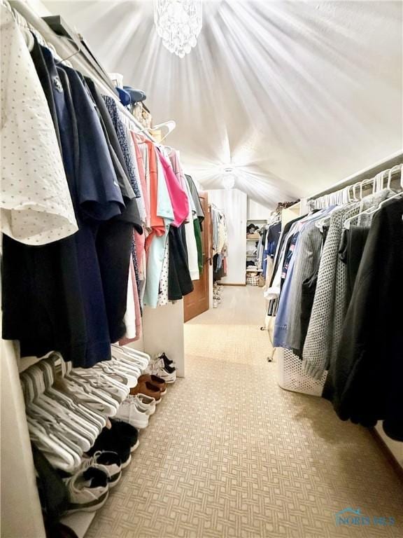 2456 Wembley Ter, Toledo, OH 43617 - walk in closet featuring carpet floors and lofted ceiling