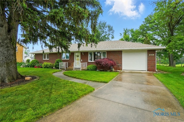 2519 Melva Ct, Toledo, OH 43611 - ranch-style house featuring an attached garage, a front yard, and brick siding