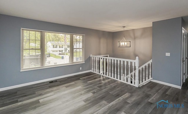 2509 Orchard Hills Blvd, Toledo, OH 43615 - spare room featuring a chandelier and wood finished floors