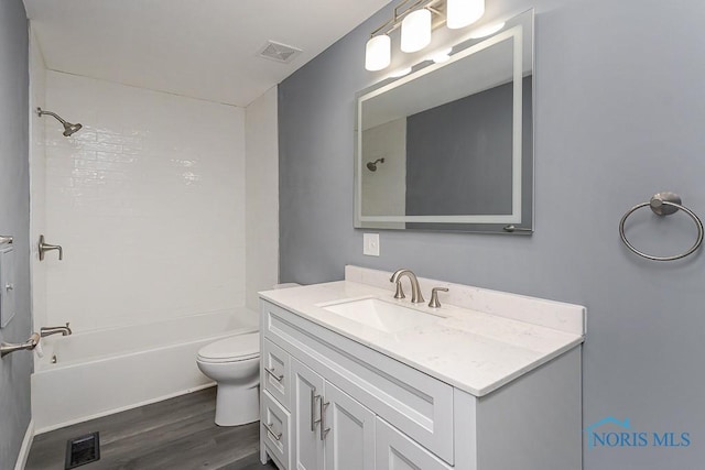 2509 Orchard Hills Blvd, Toledo, OH 43615 - bathroom with vanity, wood finished floors, and tub / shower combination