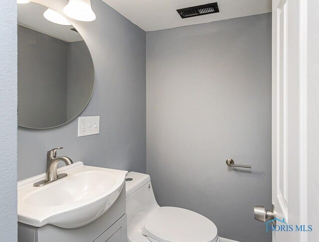 2509 Orchard Hills Blvd, Toledo, OH 43615 - half bathroom with vanity and toilet