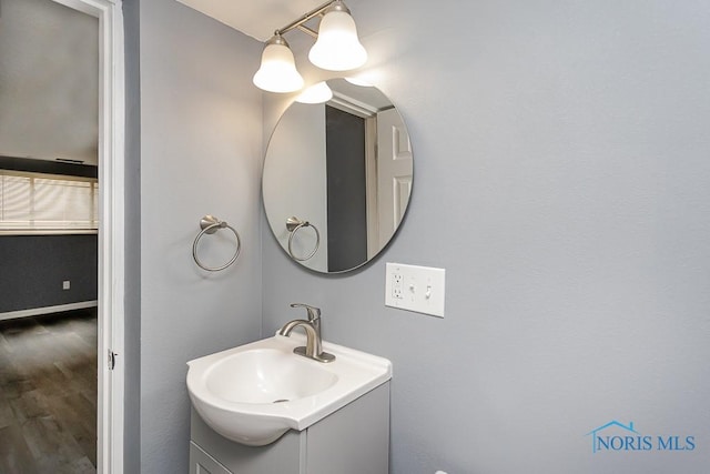 2509 Orchard Hills Blvd, Toledo, OH 43615 - bathroom featuring vanity and wood finished floors
