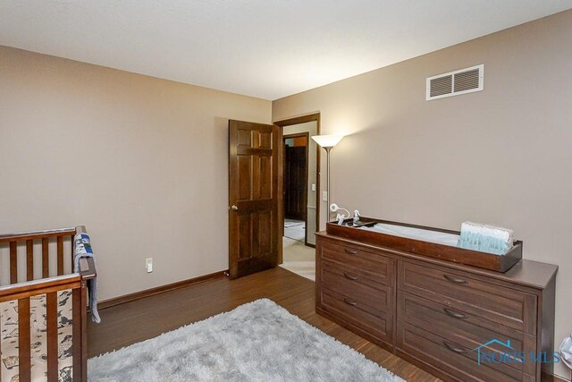 5226 Summer Dr, Sylvania, OH 43560 - bedroom with dark wood-style floors and baseboards