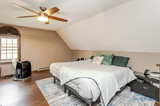 5226 Summer Dr, Sylvania, OH 43560 - bedroom featuring vaulted ceiling, ceiling fan, a baseboard radiator, and wood finished floors