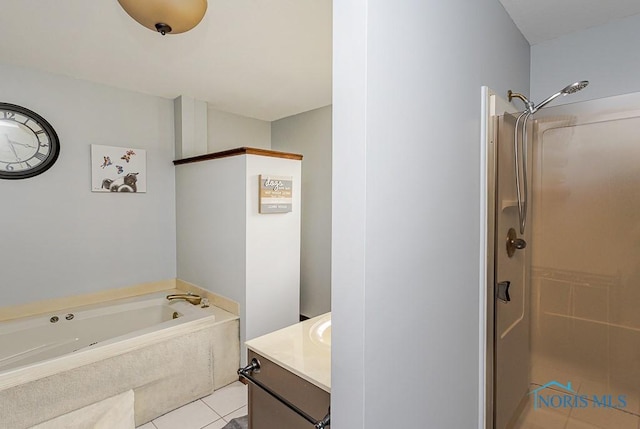 5226 Summer Dr, Sylvania, OH 43560 - bathroom featuring tile patterned floors, vanity, a bath, and walk in shower