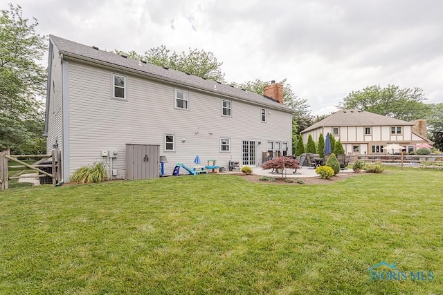 5226 Summer Dr, Sylvania, OH 43560 - rear view of property featuring a chimney and a patio