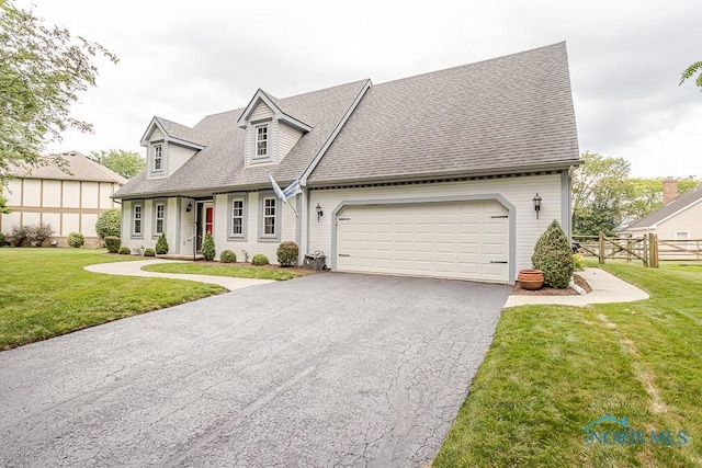 5226 Summer Dr, Sylvania, OH 43560 - cape cod-style house with driveway, a shingled roof, and a garage