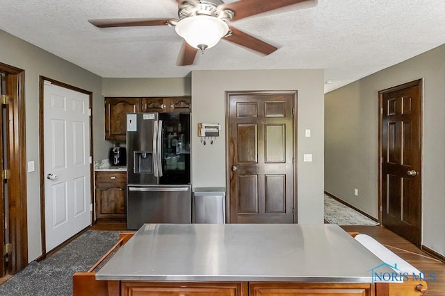 5226 Summer Dr, Sylvania, OH 43560 - kitchen with stainless steel fridge with ice dispenser, ceiling fan, a textured ceiling, wood finished floors, and light countertops