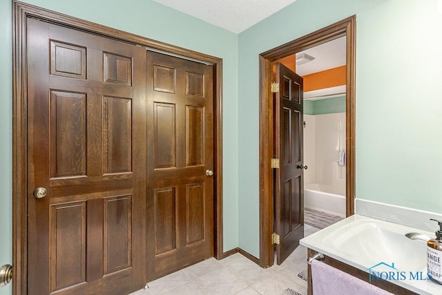 5226 Summer Dr, Sylvania, OH 43560 - full bathroom featuring vanity, a tub to relax in, and tile patterned floors