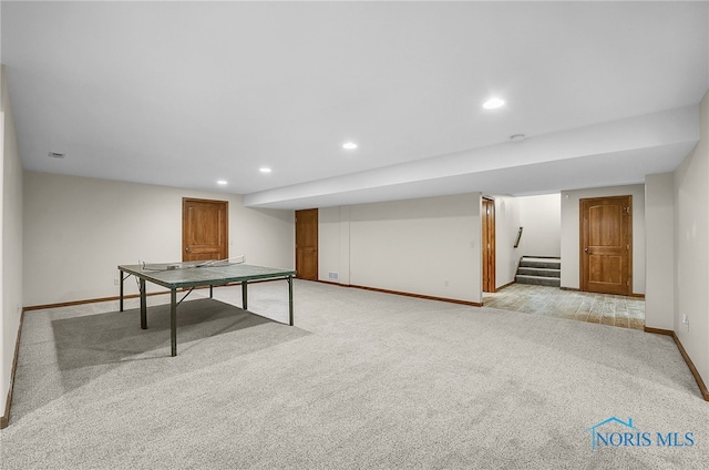 4068 Deer Ravine Ct, Maumee, OH 43537 - recreation room with light carpet and recessed lighting