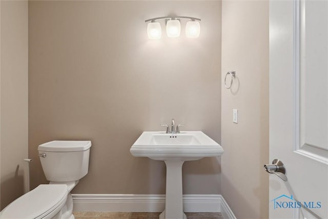 4382 Morgan Pl, Perrysburg, OH 43551 - half bathroom with toilet and baseboards