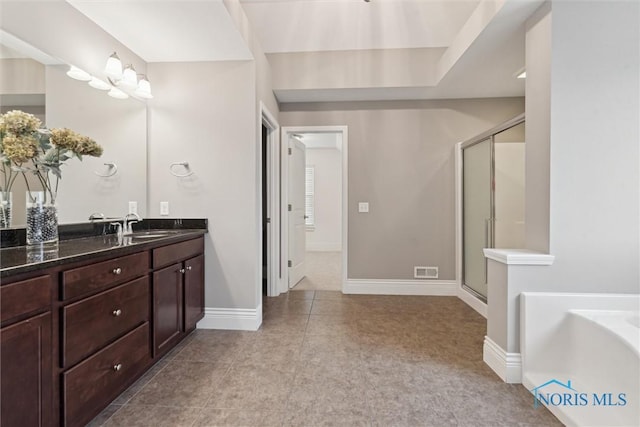 4382 Morgan Pl, Perrysburg, OH 43551 - full bath with a stall shower, vanity, a garden tub, and tile patterned flooring