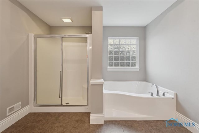 4382 Morgan Pl, Perrysburg, OH 43551 - full bath with a shower stall, a garden tub, and tile patterned flooring