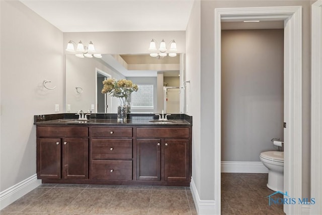 4382 Morgan Pl, Perrysburg, OH 43551 - full bathroom featuring double vanity, a chandelier, a shower with shower door, and tile patterned flooring