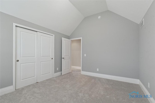 4382 Morgan Pl, Perrysburg, OH 43551 - unfurnished bedroom with carpet, lofted ceiling, and a closet