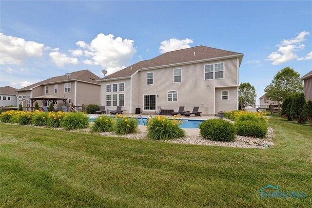 4382 Morgan Pl, Perrysburg, OH 43551 - back of property with a gazebo, a yard, an outdoor pool, and a patio area
