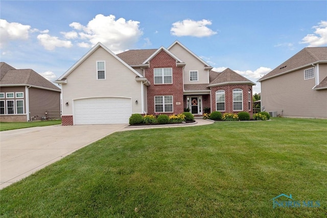 4382 Morgan Pl, Perrysburg, OH 43551 - traditional-style home featuring brick siding, an attached garage, driveway, and a front yard