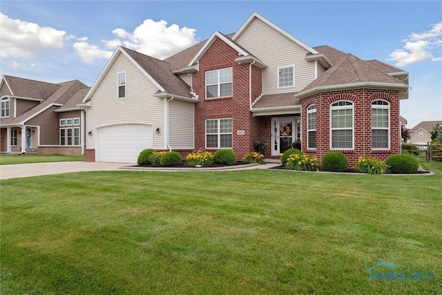 4382 Morgan Pl, Perrysburg, OH 43551 - traditional-style home featuring a garage, brick siding, driveway, and a front yard