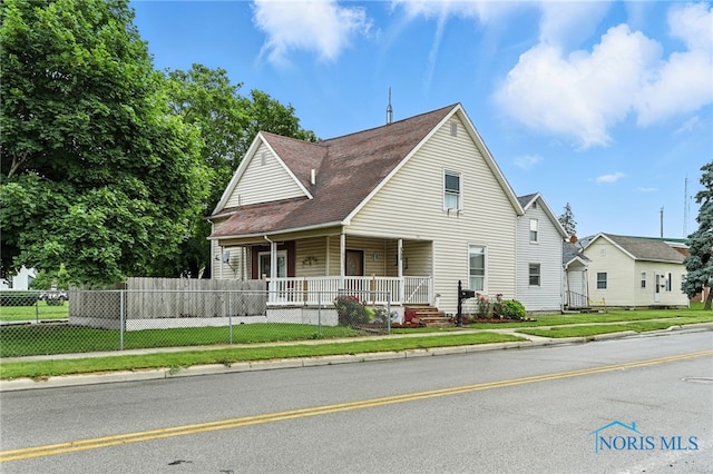 356 S Belmore St, Leipsic, OH 45856 - view of front of property with a porch and a fenced front yard