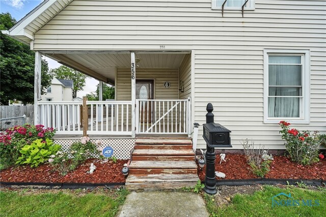 356 S Belmore St, Leipsic, OH 45856 - entrance to property with a porch