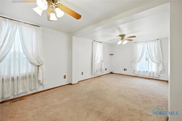 356 S Belmore St, Leipsic, OH 45856 - carpeted spare room featuring a ceiling fan and baseboards