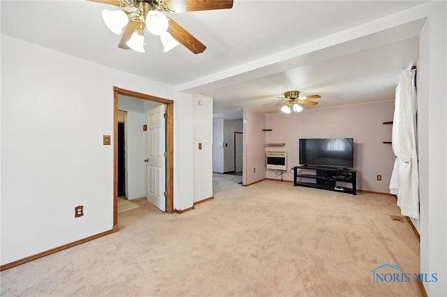 356 S Belmore St, Leipsic, OH 45856 - living area with heating unit, ceiling fan, and light colored carpet