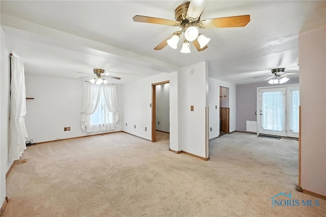 356 S Belmore St, Leipsic, OH 45856 - spare room featuring light carpet and ceiling fan