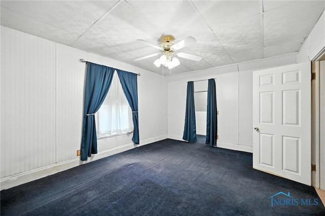 356 S Belmore St, Leipsic, OH 45856 - unfurnished room with dark carpet and ceiling fan