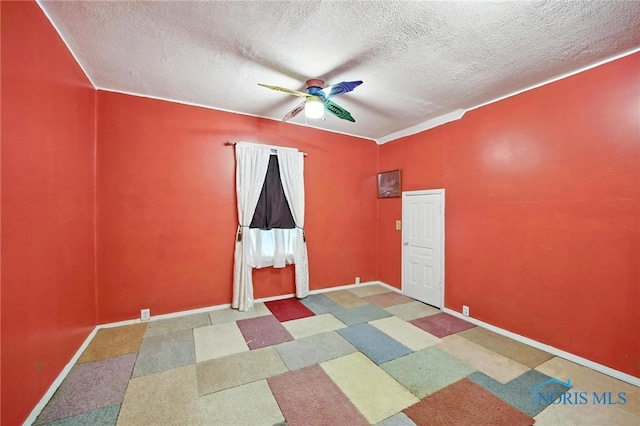 356 S Belmore St, Leipsic, OH 45856 - unfurnished room with ceiling fan, a textured ceiling, and tile patterned floors