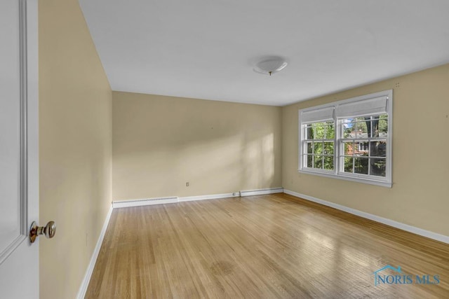 3432 Corey Rd, Toledo, OH 43615 - empty room with baseboards and wood finished floors