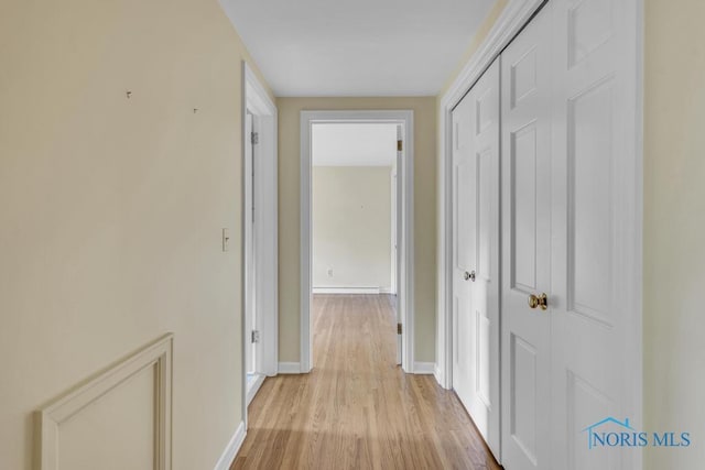 3432 Corey Rd, Toledo, OH 43615 - hallway featuring light wood-style flooring and baseboards