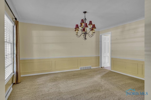 3432 Corey Rd, Toledo, OH 43615 - unfurnished dining area with ornamental molding, a chandelier, a decorative wall, carpet flooring, and wainscoting