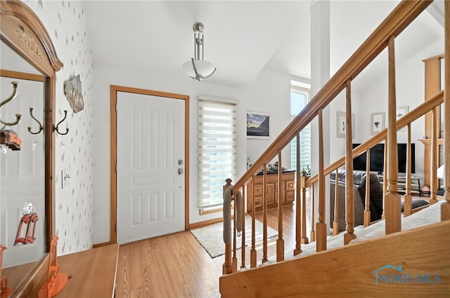 1780 Lexington Dr, Perrysburg, OH 43551 - entryway with light wood finished floors and stairway