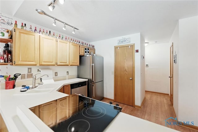 1780 Lexington Dr, Perrysburg, OH 43551 - kitchen featuring stainless steel appliances, light brown cabinetry, light wood-type flooring, light countertops, and open shelves