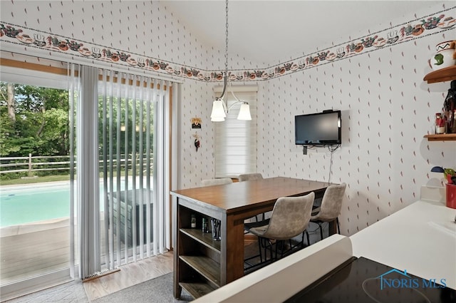 1780 Lexington Dr, Perrysburg, OH 43551 - dining area featuring wallpapered walls and vaulted ceiling