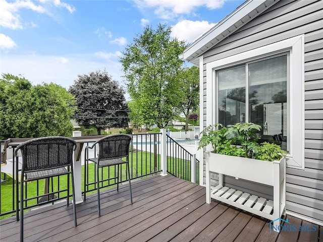 5425 Tulane Ave, Toledo, OH 43611 - wooden terrace with a yard