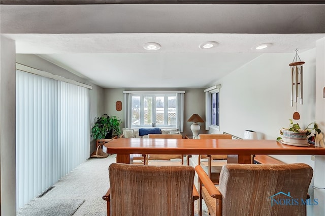 6247 Edgewater Dr, Toledo, OH 43611 - dining room with carpet flooring and lofted ceiling