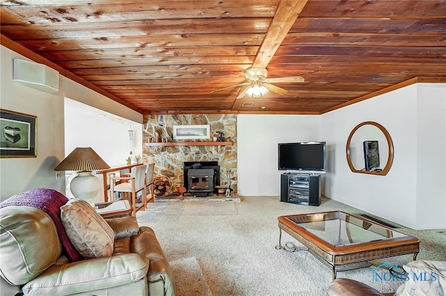 6247 Edgewater Dr, Toledo, OH 43611 - carpeted living area with wood ceiling, a wood stove, and ceiling fan