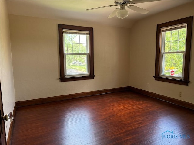 733 Mayfair Blvd, Toledo, OH 43612 - empty room with dark wood-style flooring and a ceiling fan