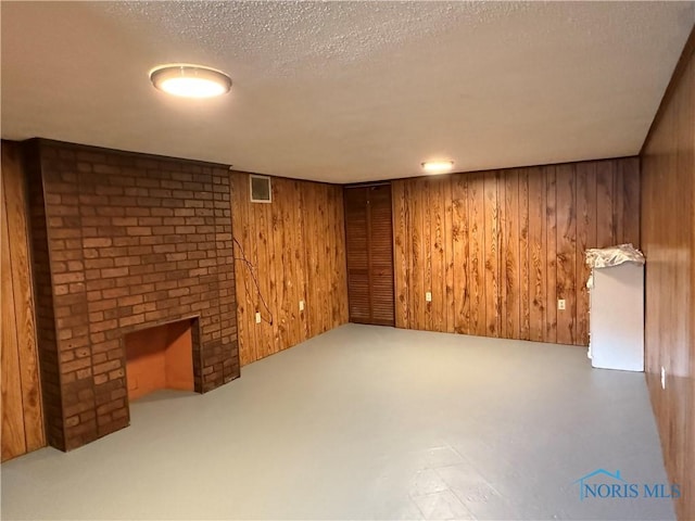 733 Mayfair Blvd, Toledo, OH 43612 - finished below grade area with wooden walls and a textured ceiling
